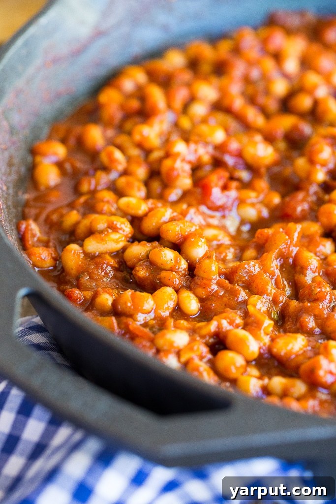 Stovetop Simmered Vegan Beans 4 Close-up of a skillet filled with bubbling vegan stovetop baked beans