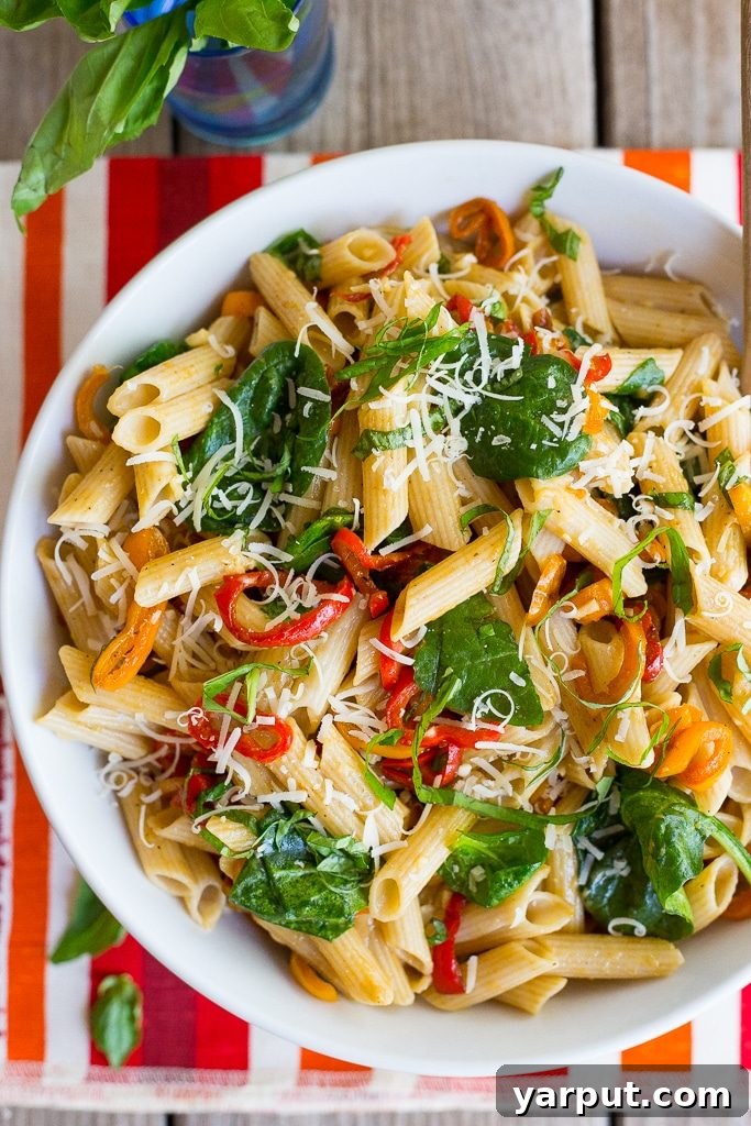 Sweet Pepper Balsamic Pasta with Fresh Spinach and Shaved Parmesan 3 Close-up of freshly cooked Balsamic Sweet Pepper Pasta with Parmesan and Basil Ready to Serve