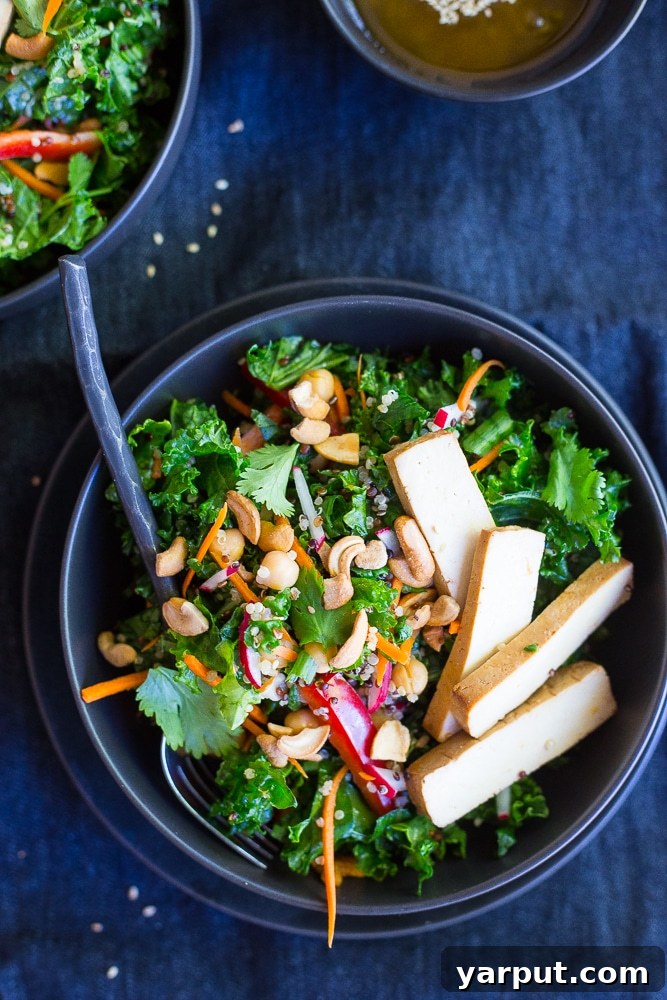 Nourishing Asian Kale Salad 2 This Asian Kale Power Salad is packed with protein, flavor and crunch to keep you feeling full all afteroon! Perfect for lunch! Gluten free and vegan too!