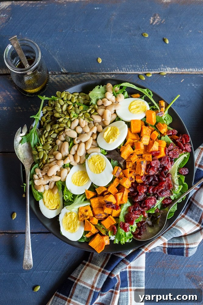 Roasted Sweet Potato Vegetarian Cobb 5 Close-up of a refreshing Vegetarian Cobb Salad with Roasted Sweet Potato, showcasing vibrant colors and textures.