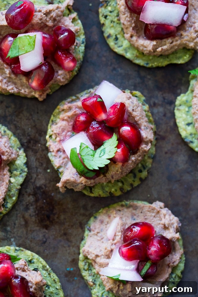 Kale Crackers with Black Bean Hummus and Pomegranate Salsa- A delicious and fun snack or appetizer to serve at your next party! Gluten free and vegan!