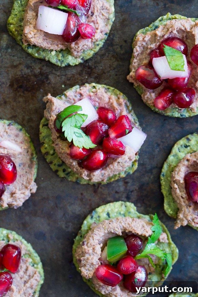 Kale Crackers with Black Bean Hummus and Pomegranate Salsa- A delicious and fun snack or appetizer to serve at your next party! Gluten free and vegan!