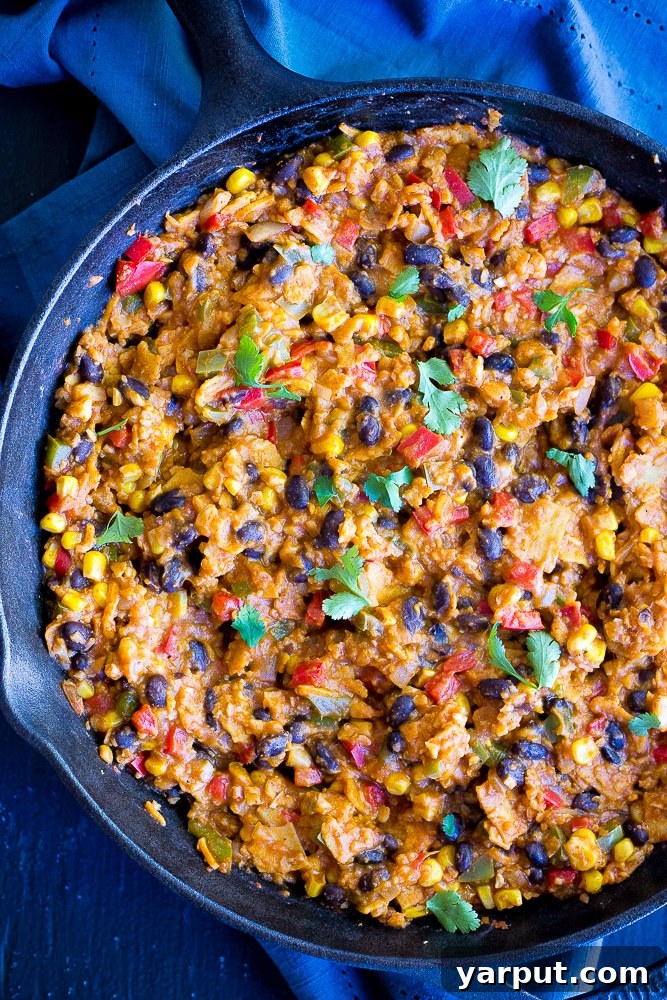 Simple Skillet Enchiladas with Cauliflower Rice 4 Easy Stove Top Enchiladas with Cauliflower Rice - This delicious vegetarian dinner recipe is packed with vegetables making it a really healthy option that everyone will love! Comes together in no time for a quick and easy weeknight dinner! Vegan and gluten free!