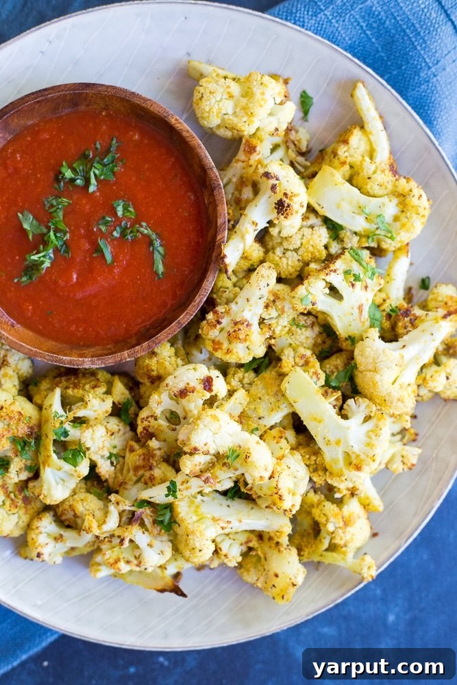 Cauliflower Pizza Poppers 2 Healthy Baked Cauliflower Pizza Bites, perfect for a quick snack, appetizer, or side dish. These vegan and gluten-free bites offer a delicious pizza-inspired flavor.