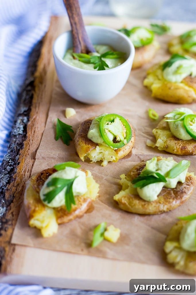 Guilt-Free Mexican Delights 21 Vegan Crispy Smashed Potatoes served with a zesty Jalapeño Ranch dip.