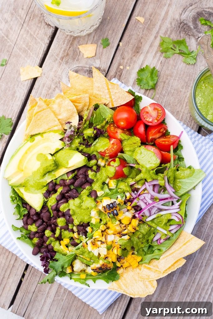 Guilt-Free Mexican Delights 15 Refreshing Summer Taco Salad Bowls with a vibrant Chimichuri Dressing.