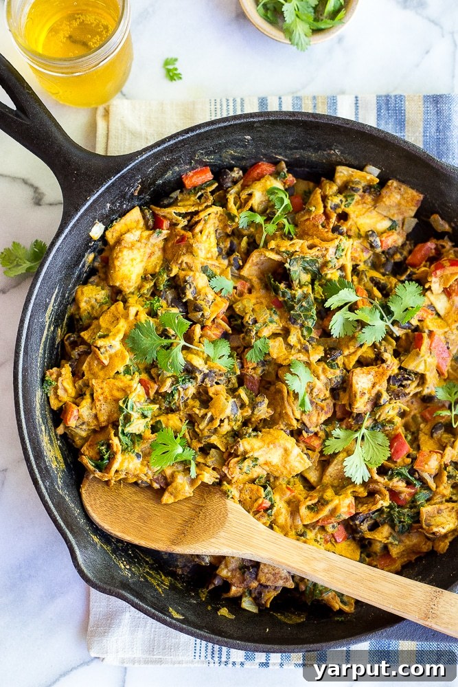 Guilt-Free Mexican Delights 27 A bubbling Cheesy Vegan Taco Skillet, a comforting and plant-based dish.