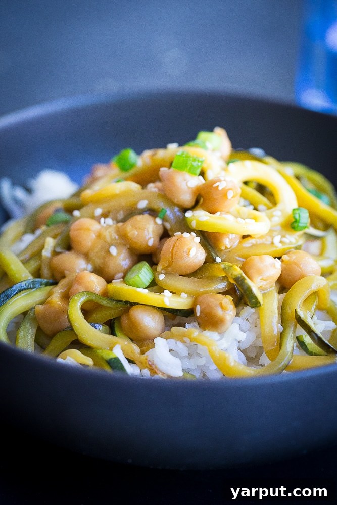 30-Minute Orange Ginger Chickpea Zoodle Bowls 4 Fresh spiralized zucchini noodles ready to be cooked for a healthy meal