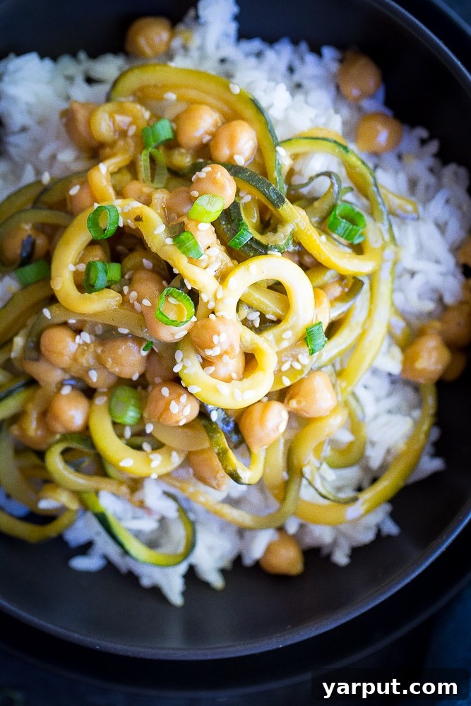 30-Minute Orange Ginger Chickpea Zoodle Bowls 7 A close-up shot of the fresh ingredients in the Zucchini Noodle Chickpea Bowl