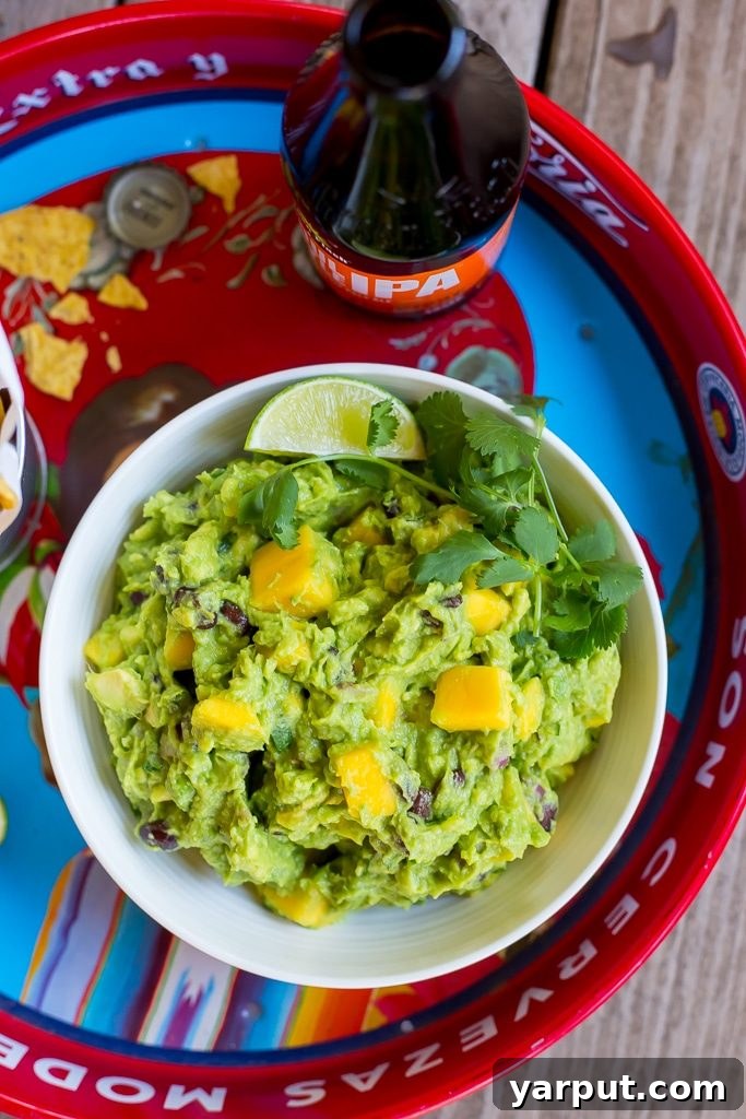 55 Refreshing & Healthy Summer Sides 42 Mango Black Bean Guacamole, a sweet and savory tropical dip