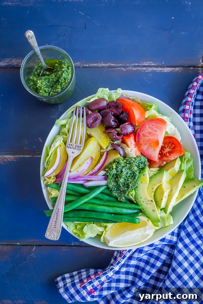 Vibrant Pesto Avocado Nicoise 5 Avocado Nicoise Salad with Pesto - A delicious and refreshing vegan version of the classic nicoise salad! Filled with tons of veggies making it a healthy lunch or side dish. Vegan/Gluten Free/Vegetarian