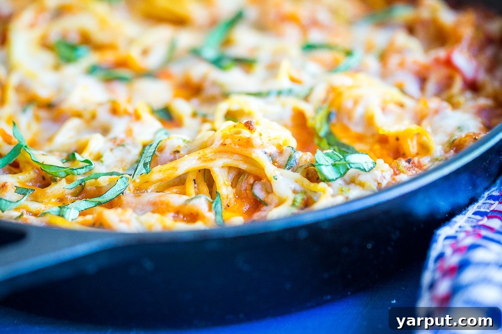 Guilt-Free Zoodle Spaghetti Bake 5 Lower Carb Zucchini Noodle Spaghetti Bake - This delicious pasta bake is packed with tons of zucchini and just small amount of pasta making it a great low carb dinner option. Vegetarian/ Quick and Easy Dinner/ Gluten Free/ Low Carb Dinner