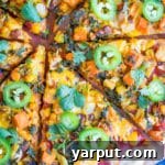 Southwest Fiesta Pizza 6 Thumbnail of Southwest Veggie Taco Pizza, highlighting its vibrant colors and delicious toppings.