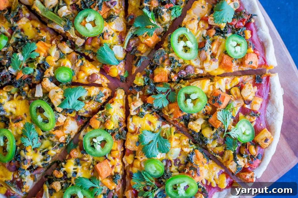 Southwest Fiesta Pizza 7 Close-up of a Southwest Veggie Taco Pizza, showcasing its vibrant and healthy ingredients, ideal for dinner.