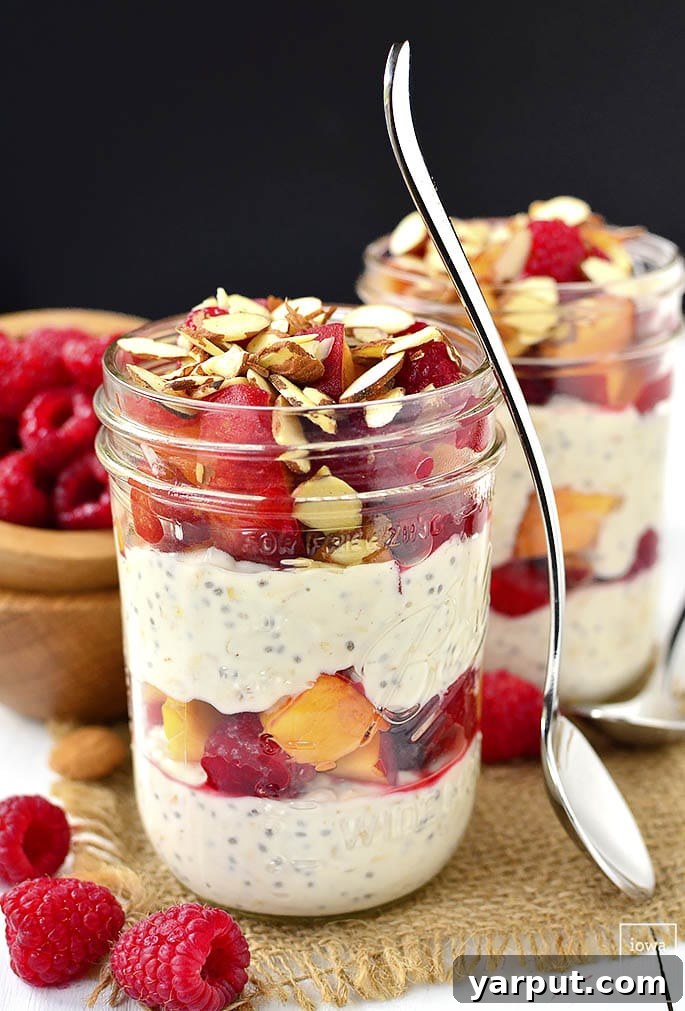 Make-Ahead Raspberry-Peach Crisp Breakfast Parfaits - layers of fruit, crisp, and yogurt for a delightful meal.