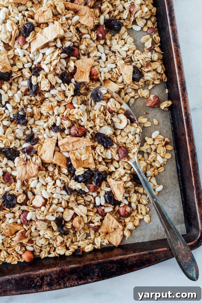 Homemade Apple Cinnamon Granola - crunchy, flavorful, and perfect for make-ahead breakfast bowls or snacks.