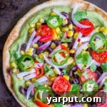Thumbnail image of a Guacamole Pita Pizza, ready to be served.