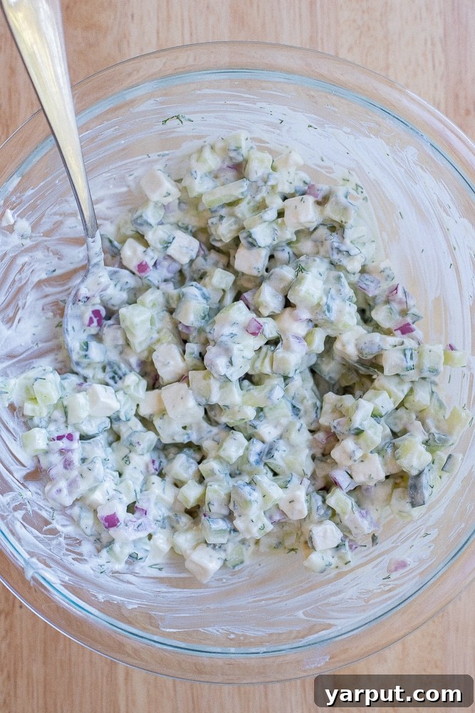 Chunky Tzatziki Cucumber Salad Recipe with Fresh Dill and Garlic 5 chunky tzatziki cucumber salad in a serving bowl
