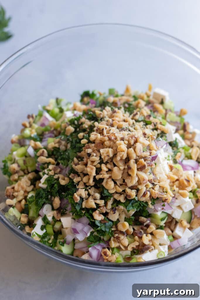 all sweet pea salad ingredients together in a mixing bowl