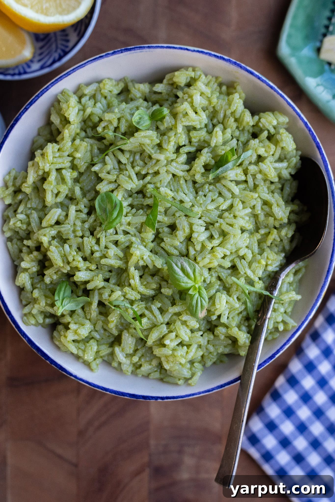bowl of fresh lemon basil rice with a spoon