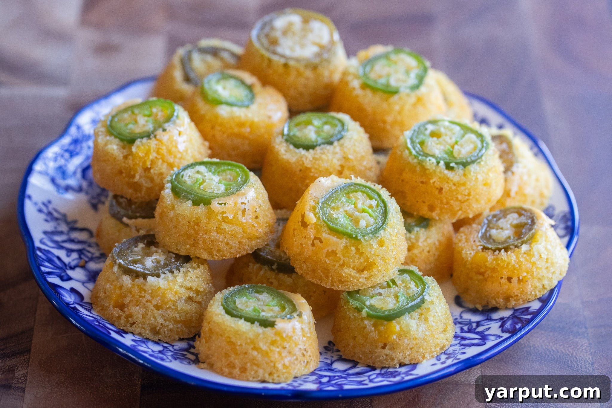Serving plate full of upside down jalapeño cornbread bites